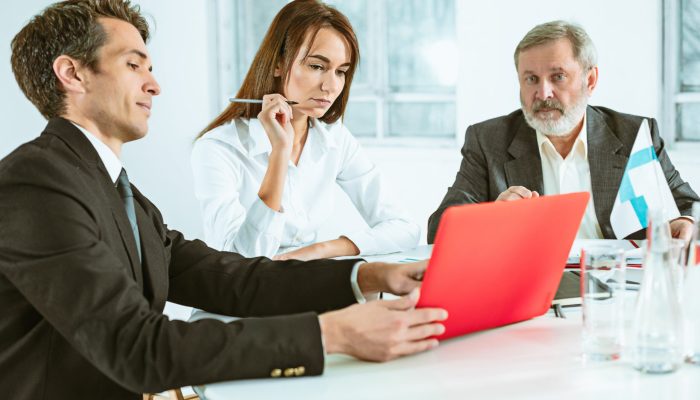 The business people working together at table. The meeting or summit concept